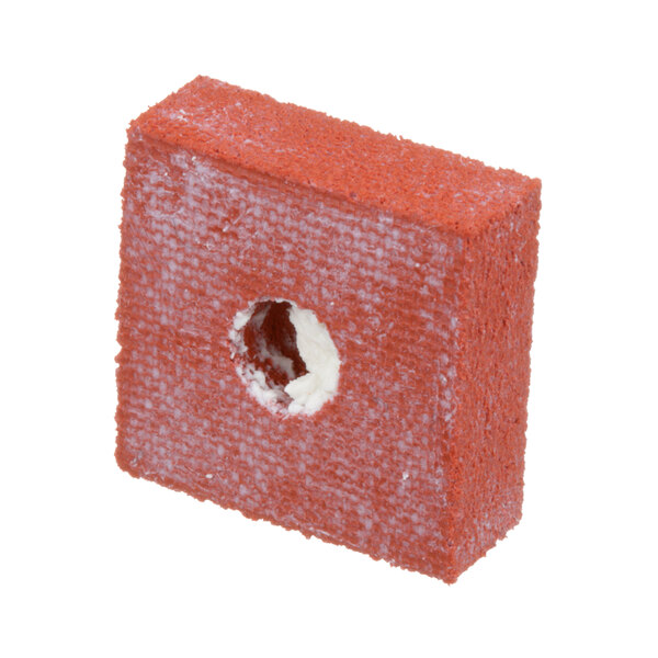 A red square object with a hole in it.