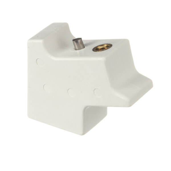 A white Hobart retainer magnet with a metal screw hole.