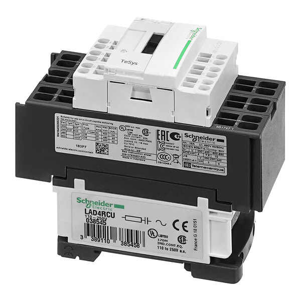 A white electrical contactor with a green stripe and label.