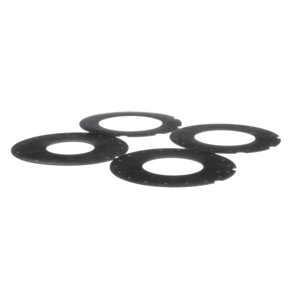 A group of black circular rubber washers.