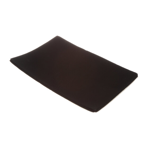 A black rectangular adhesive plate.