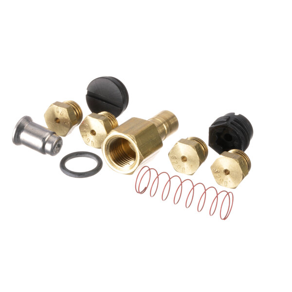 A group of brass and metal Pitco gas conversion parts.