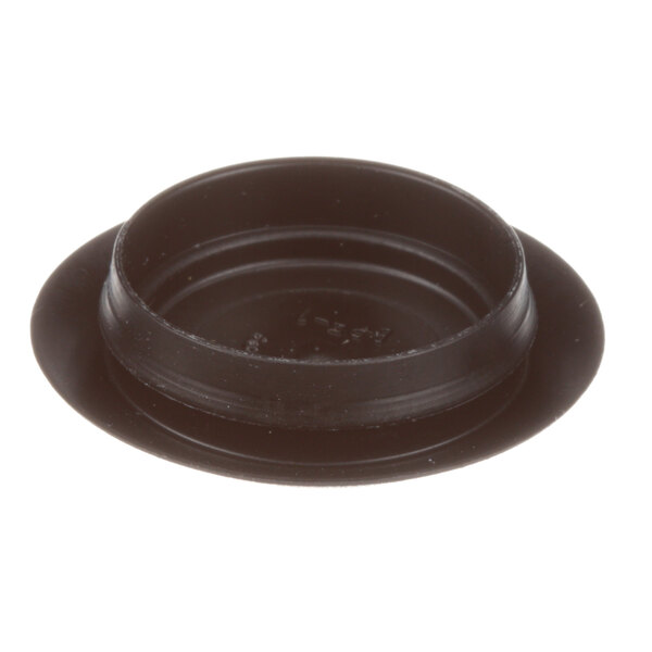 A black plastic Groen cover cap with a black circle in the center.