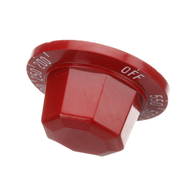 A red plastic Vulcan thermostat knob with white text.