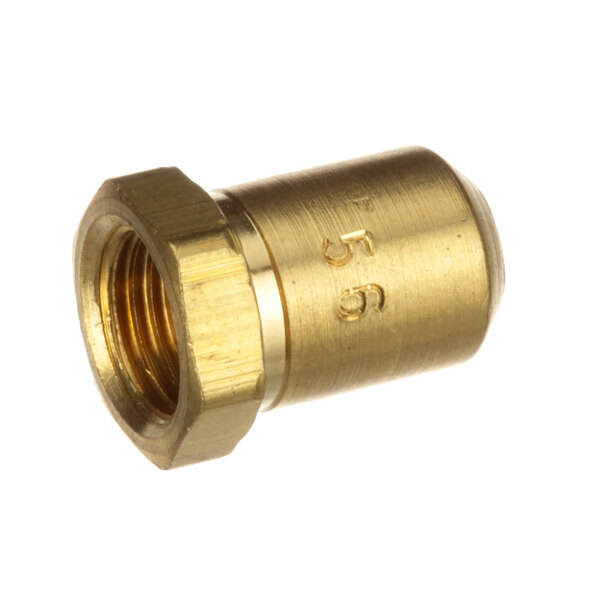 A close-up of a brass nut with a number on it