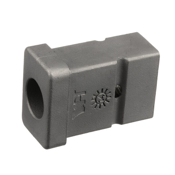 A grey plastic Henny Penny insert connector with a small hole.