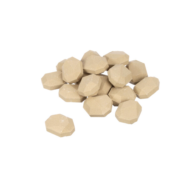 A pile of beige stone briquettes on a white background.