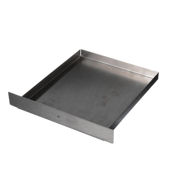 A stainless steel metal tray with a handle and a hole in it.