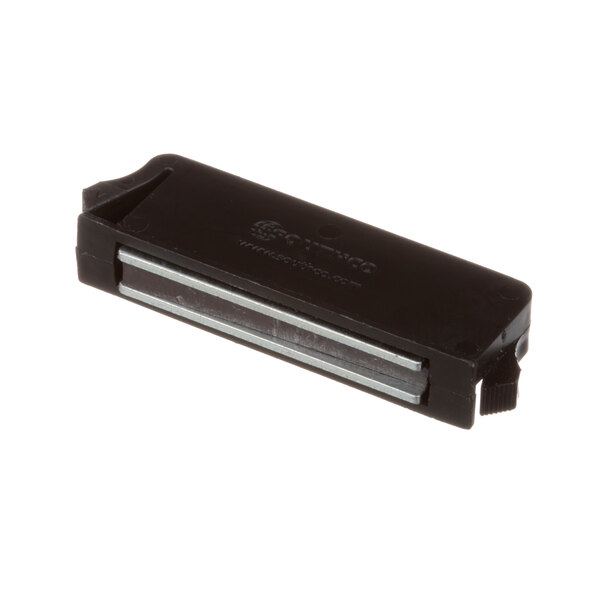 A black rectangular plastic object with a silver metal strip.