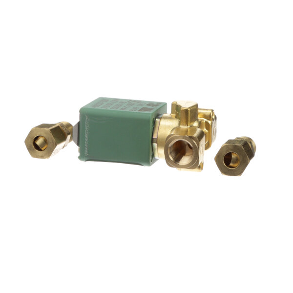 A close-up of a green Winston Industries water solenoid valve with two brass fittings.