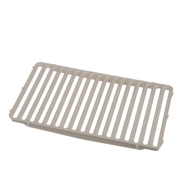 A white plastic grate with holes.
