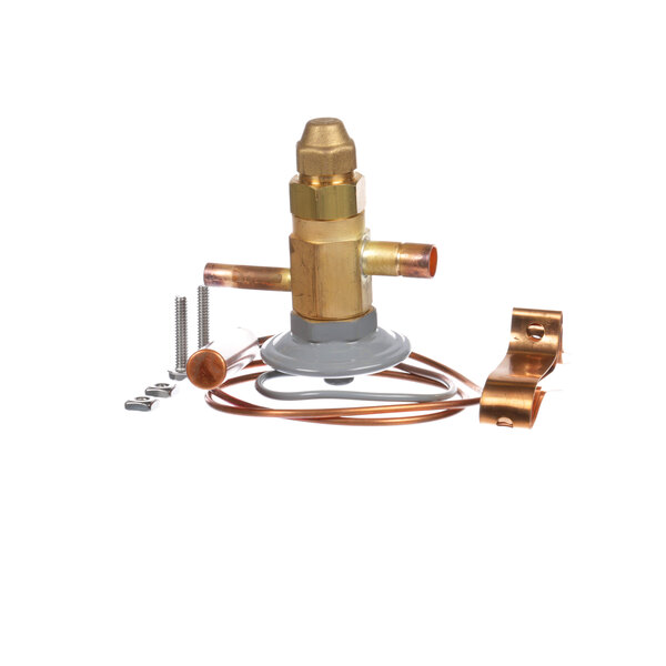 A Traulsen expansion valve with copper pipe connections.