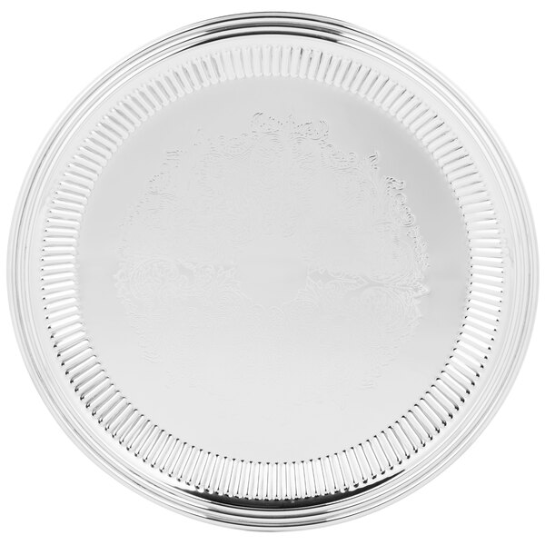A silver plate with a circular design.