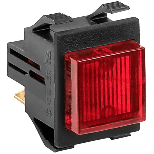 A red light switch with a black cover.