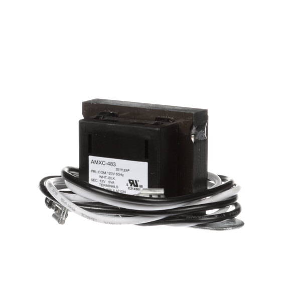 A black Metro RPC13-183 electrical transformer with white and black wires.
