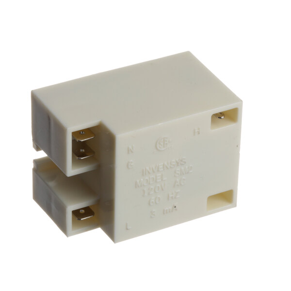 A white square Duke spark module with two terminals.