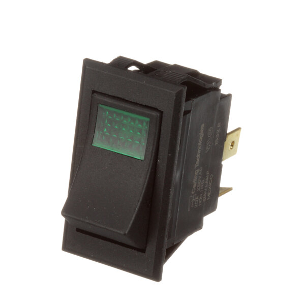 A black rectangular device with a black switch and a green light.