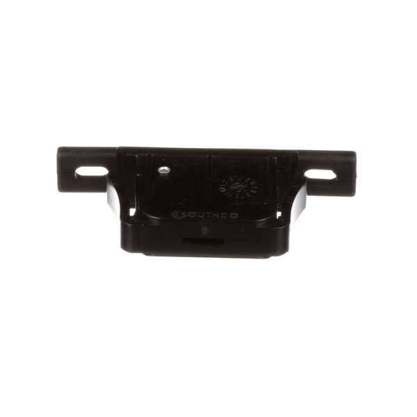 A black rectangular plastic Grindmaster-Cecilware latch with holes.