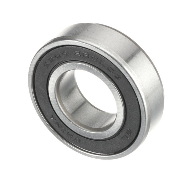 A close-up of a stainless steel Robot Coupe R662 top motor bearing.