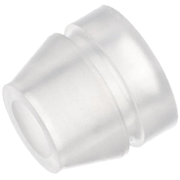 A clear plastic bushing with a hole on a white surface.