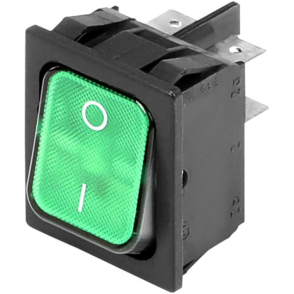 A green rocker switch with white text on the top.