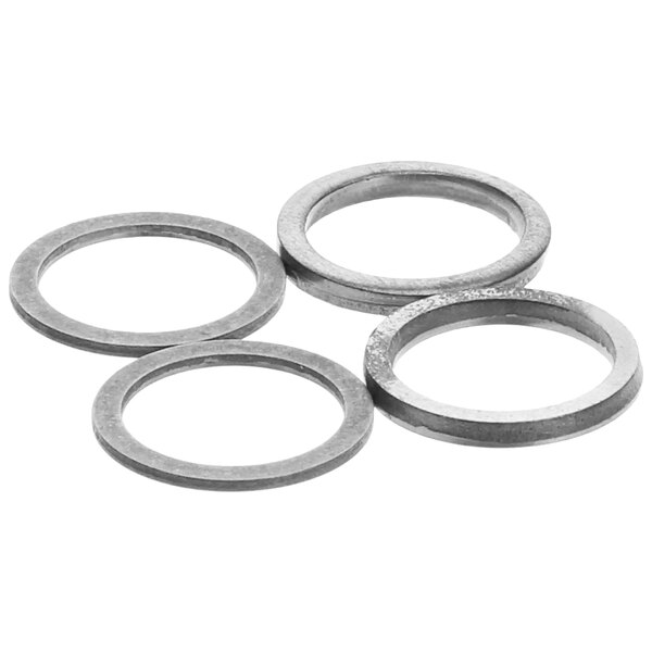 A group of silver round metal washers.