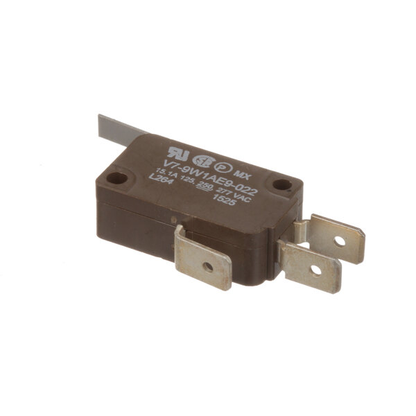 A brown Blodgett micro switch with a metal handle.