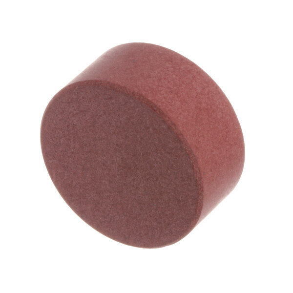A red round disc with a hole in the middle.