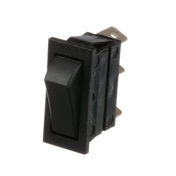 A close up of a black Jade Range rocker switch with a metal strip.