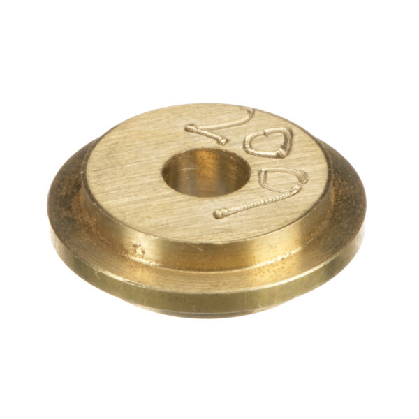 A gold Cleveland Gas Orifice Prop with a hole in the center.