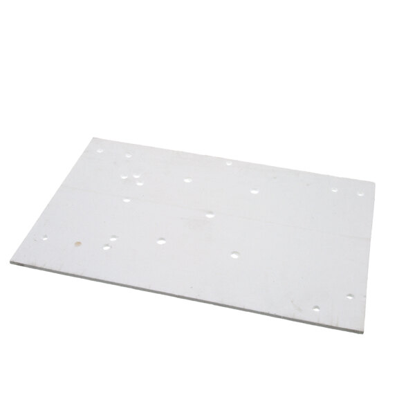 A white rectangular plastic sheet with holes.