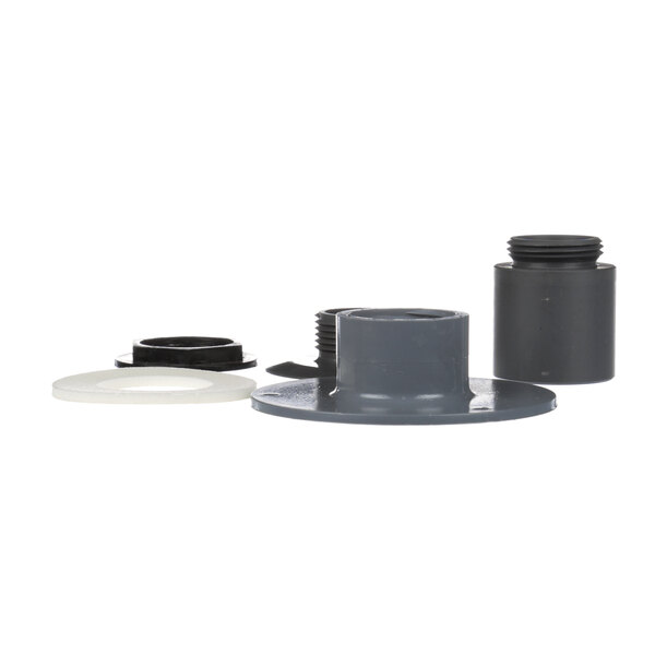 A group of black and white plastic parts including a black cylinder with a white cap and a grey pipe with a black lid.