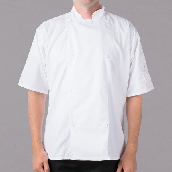 A man wearing a white Mercer Culinary chef's jacket.