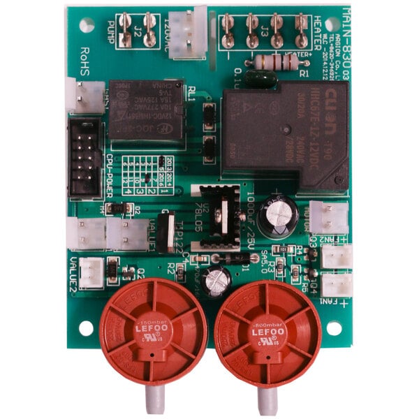 A green circuit board with red and white components.