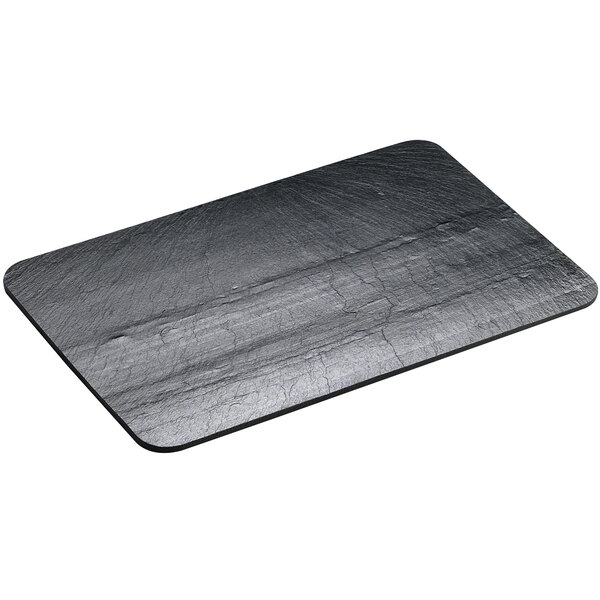 A black rectangular slate serving stone.