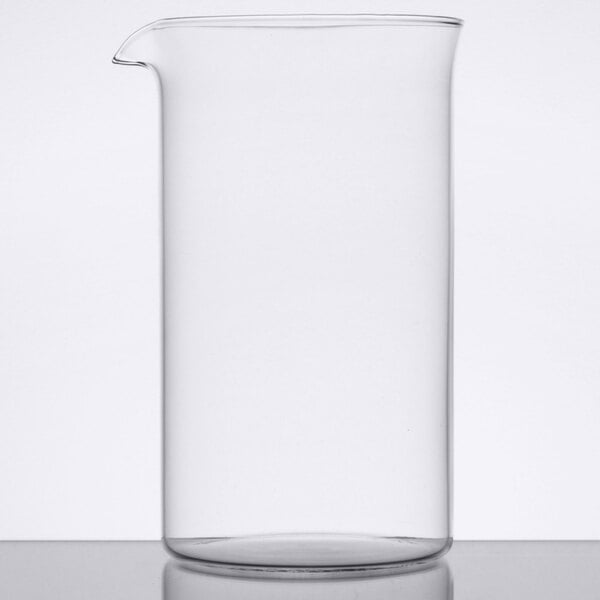 A clear glass Libbey French press carafe on a table.