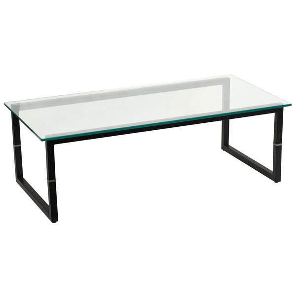 A Flash Furniture black metal coffee table with a glass top.