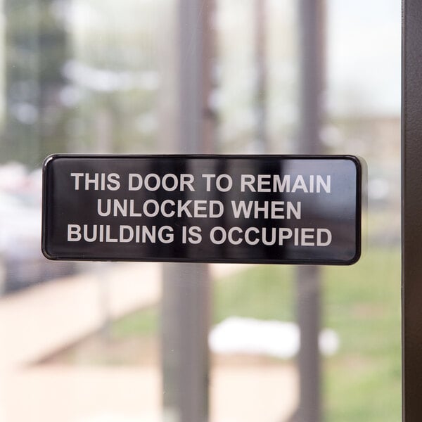 Black and... This Door To Remain Unlocked When Building Is Occupied Sign 