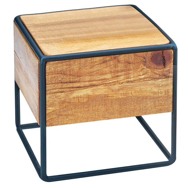 A wooden box with metal legs.