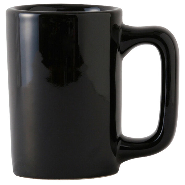 A close up of a black Tuxton Texan mug with a handle.