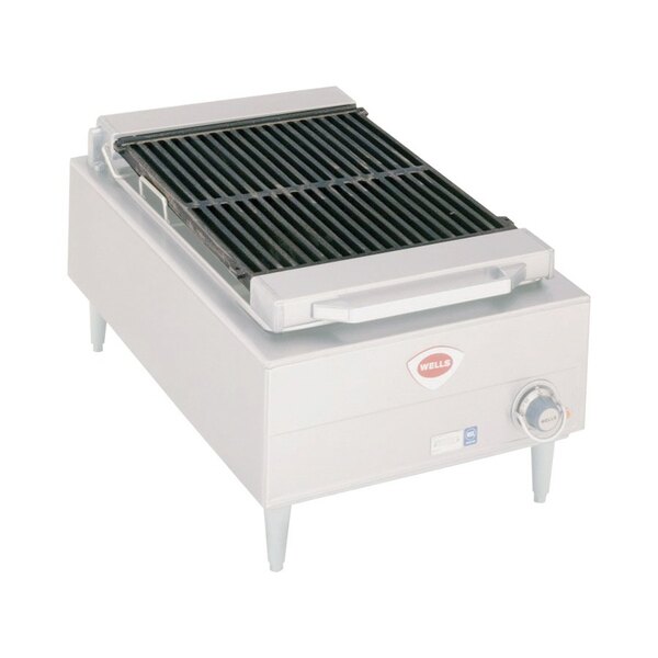A white rectangular Wells charbroiler grate with a black grill on top.