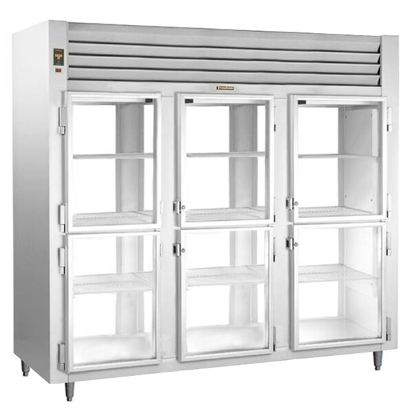 A stainless steel Traulsen reach-in refrigerator with three glass half doors.