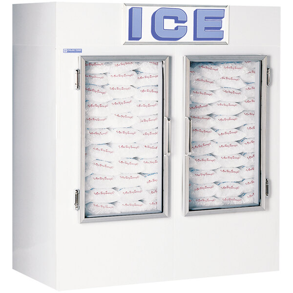 A white Polar Temp ice merchandiser with two glass doors full of bags of ice.