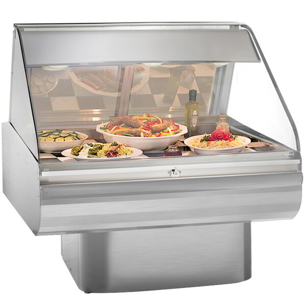 An Alto-Shaam stainless steel heated display case with food on plates.