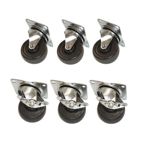 A set of six True plate casters with black rubber wheels and chrome steel frames.