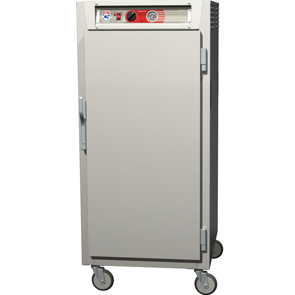 A stainless steel Metro C5 heated holding cabinet with a white door.