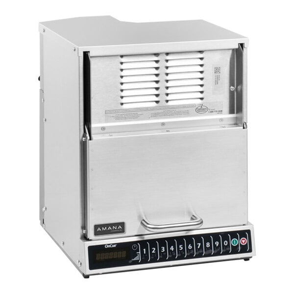 A silver Amana commercial microwave with a black and white panel.