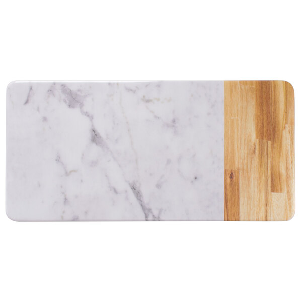 An Elite Global Solutions faux alder wood and Carrara marble rectangular serving board with wood and marble surfaces.