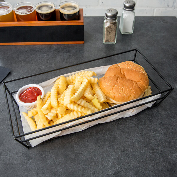An American Metalcraft black rectangular basket with a burger and fries in it.