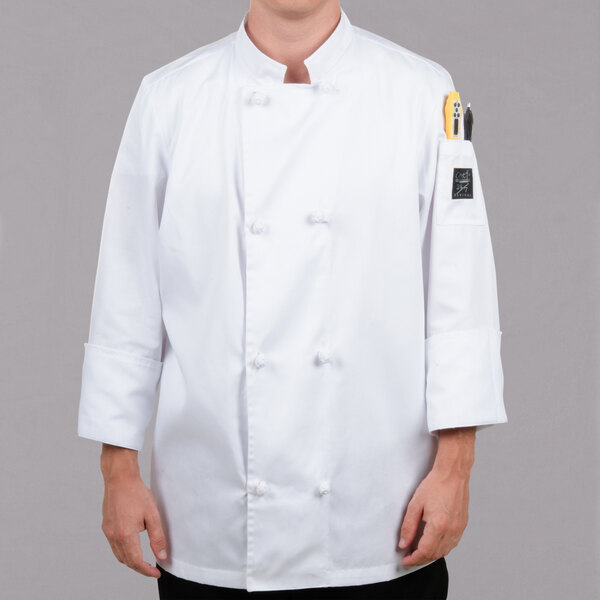 A man wearing a white Chef Revival chef coat.